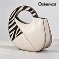 Qelnuvazi™ Zebra Halo Leather Top-Handle Bag